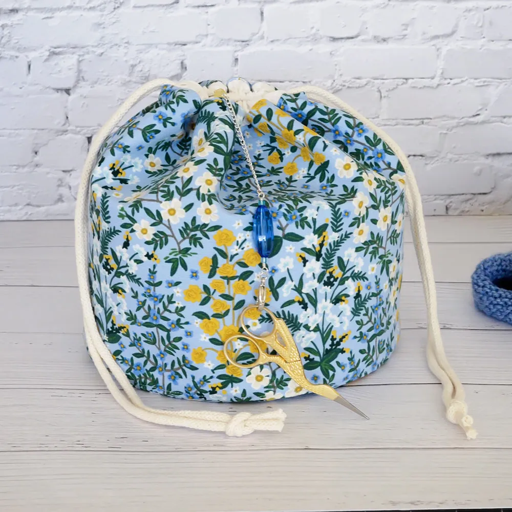 Blue Floral Canvas Bucket Bag Featuring a Scissor Chain by Mable and Rose