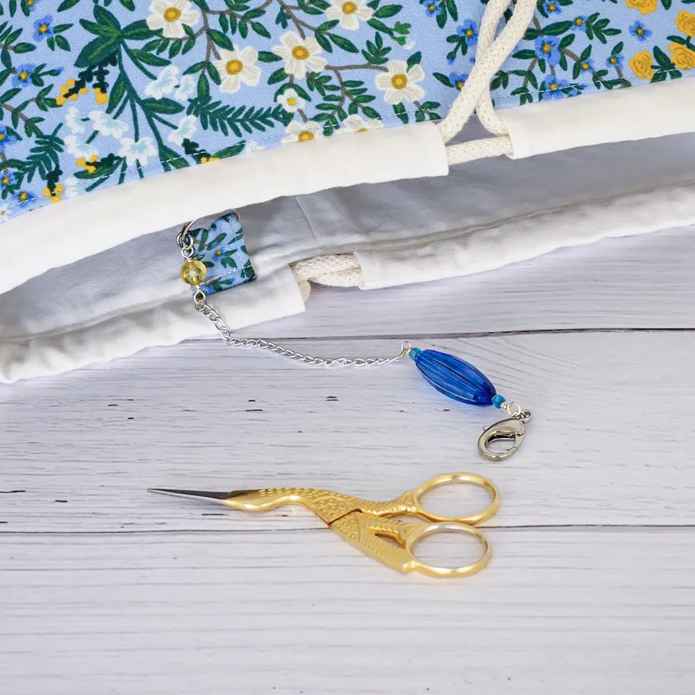 Blue Floral Canvas Bucket Bag Featuring a Scissor Chain by Mable and Rose